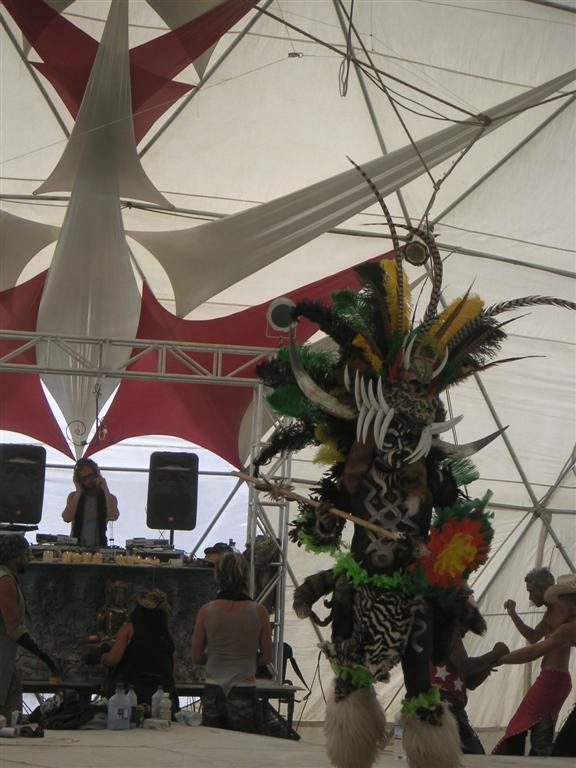 Tribal costume of some sort in the techno dome