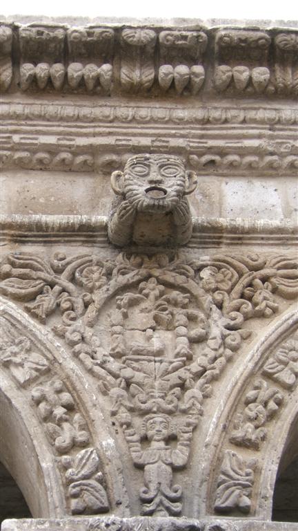 Detail of a drain spout and column in the plaza