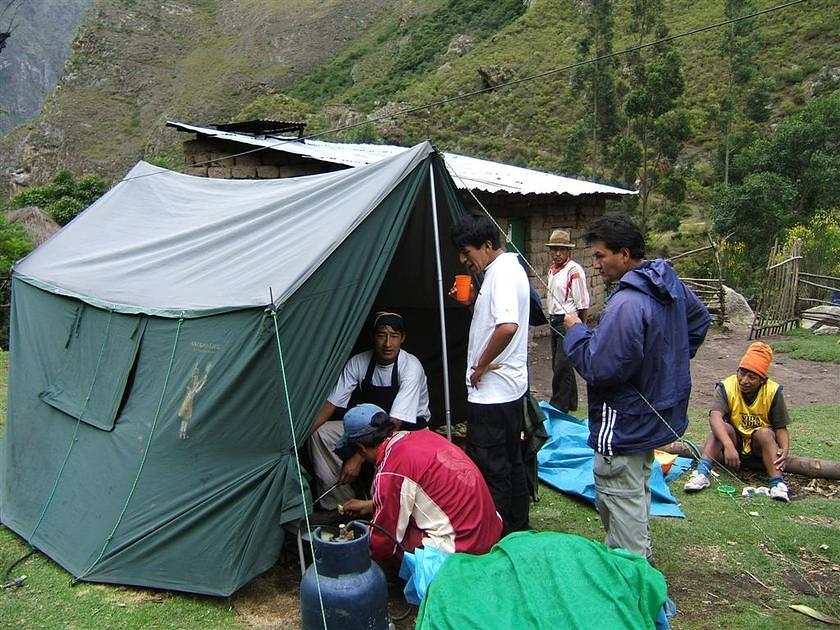 Porters preparing lunch.  This was luxury camping.