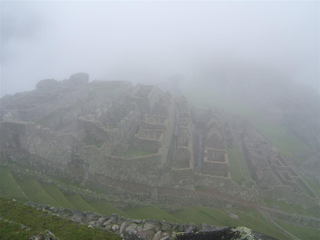 Machu Picchu peeks through the clouds