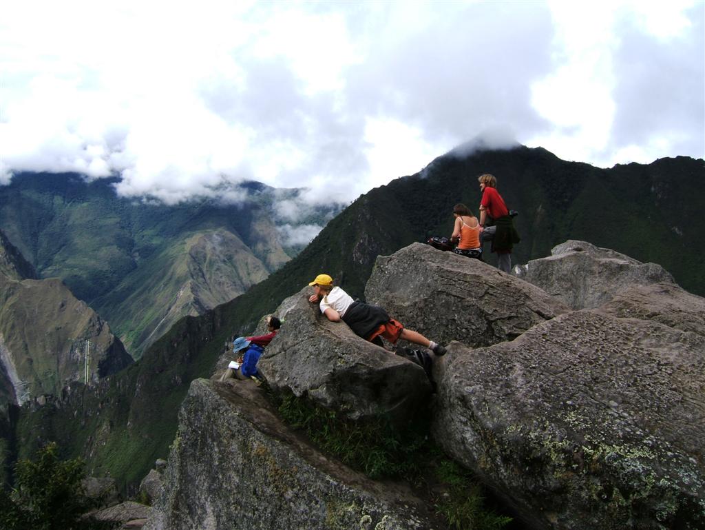 Lucy enjoys the view of the sacred valley from the very top of Huayna Picchu