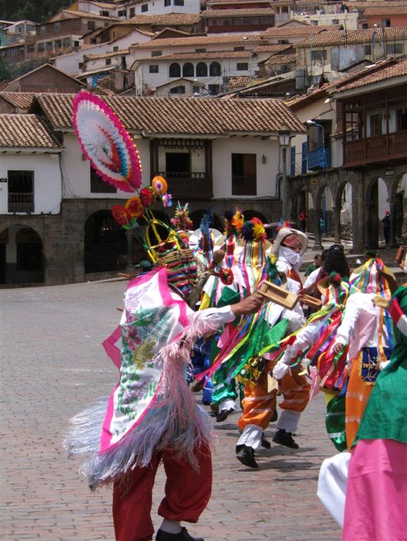 Noisemaker, dancing, singing, and walking around the Plaza