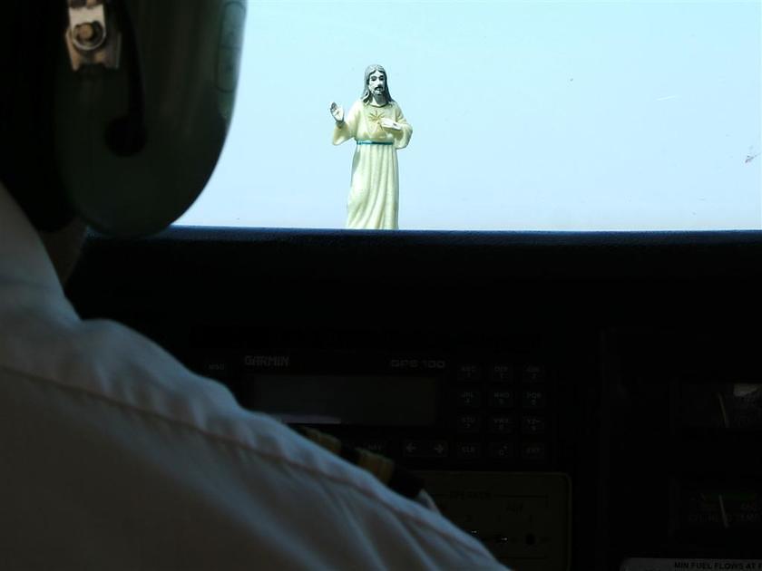 Jesus on the airplane dash