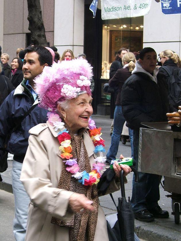 Fuzzy pink hat and a lei