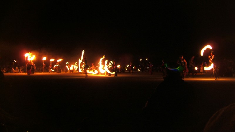 Fire spinners before the burn