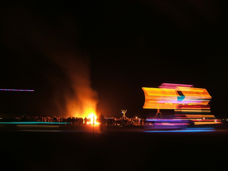 Remains of the man burn as art cars zoom by