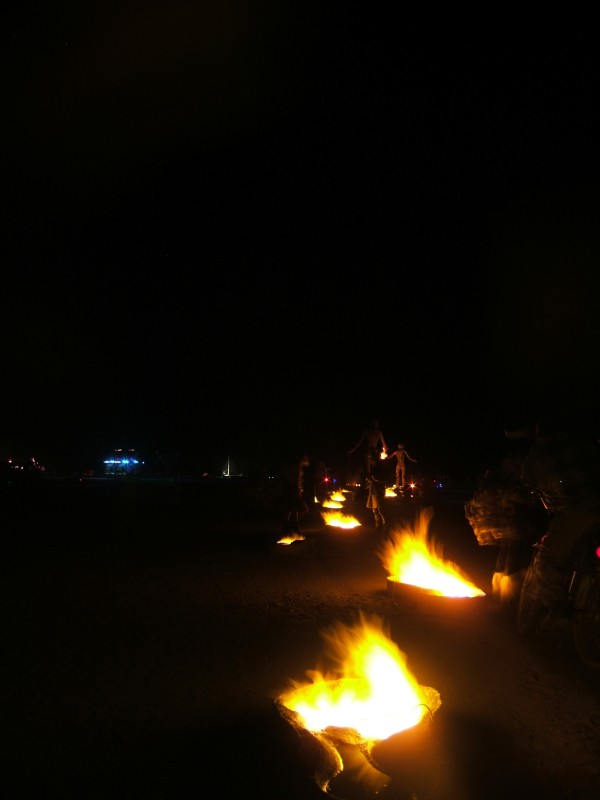 Flaming footprints of Passage's mother and daughter