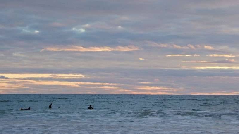 Surfers enjoying the sunset