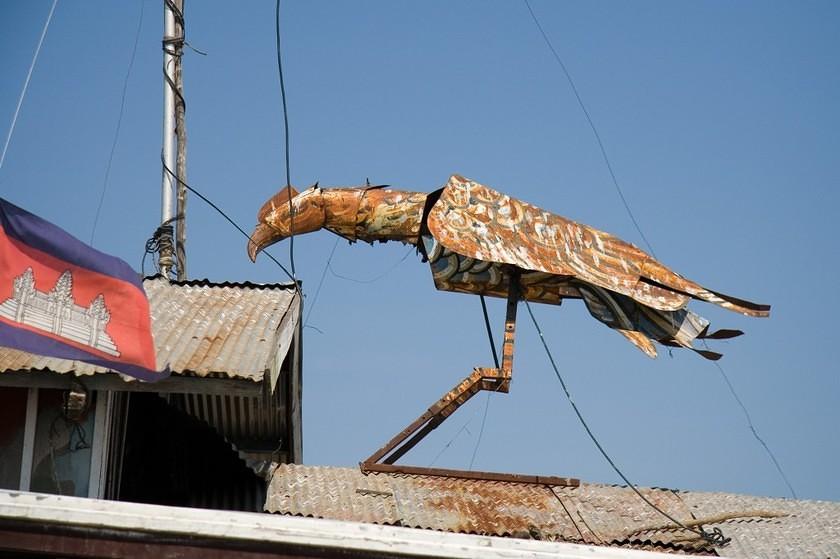 Metal bird and flag