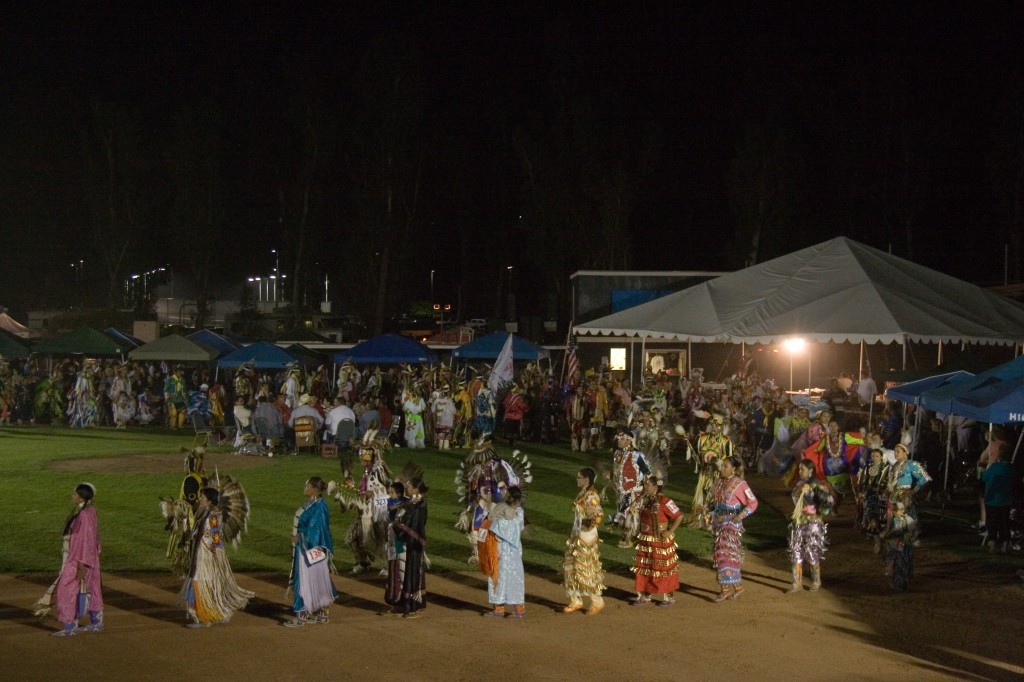 Woman jingle and traditional dancers in the powwow grand entry