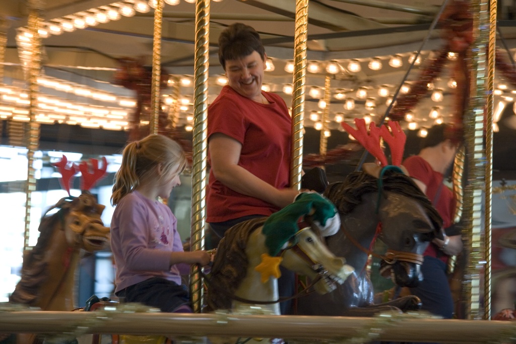 Mom and Dannica on the carousel