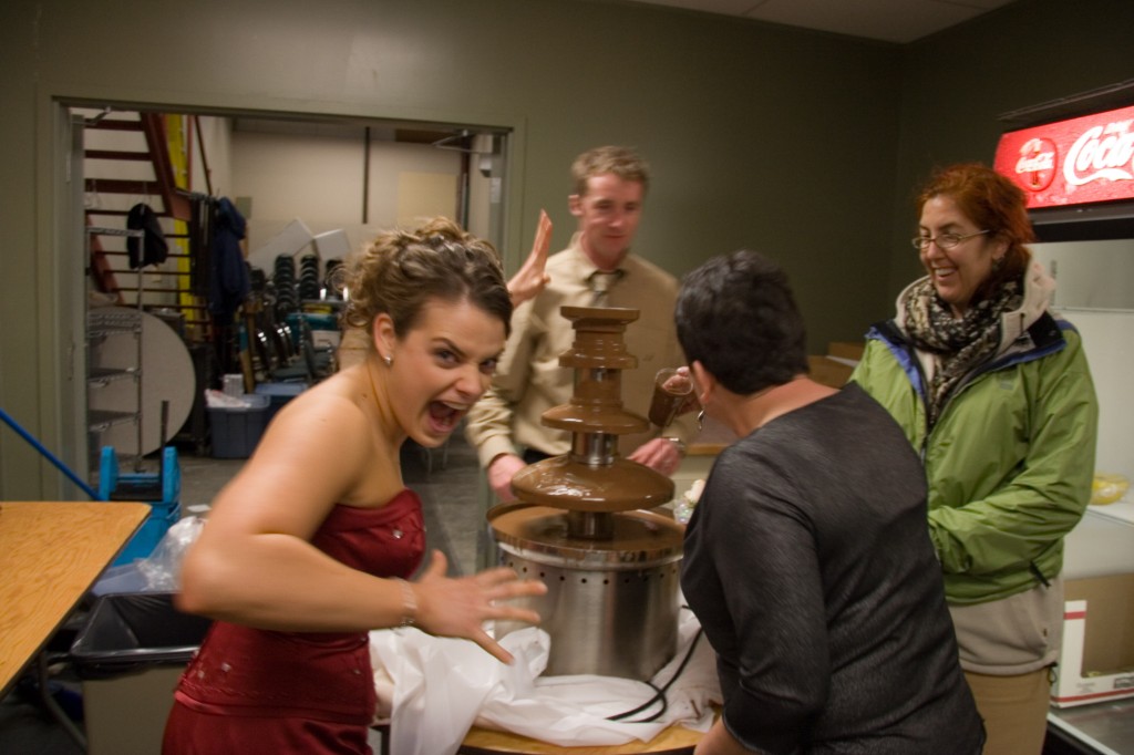 Having some fun cleaning out the chocolate fountain