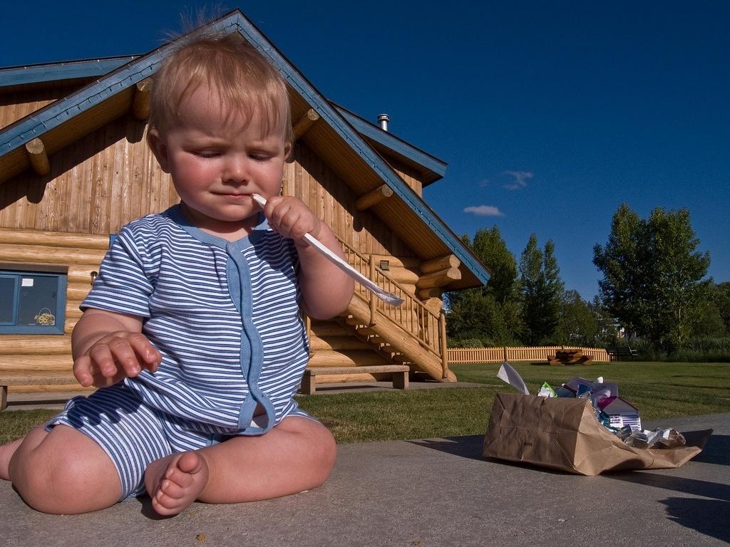 Carson munching a straw