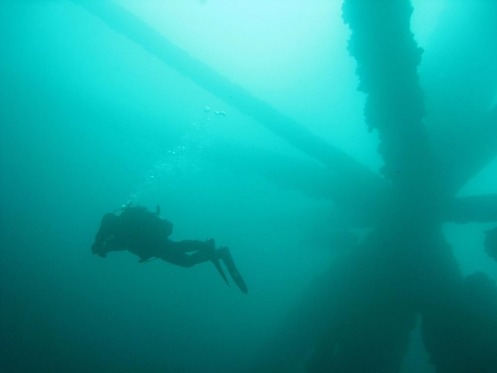 Chris diving under the Ellen oil rig