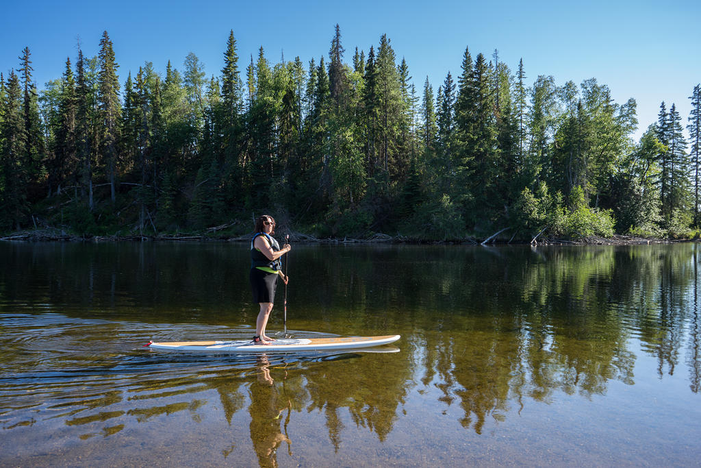 Anna getting the hang of the paddleboard