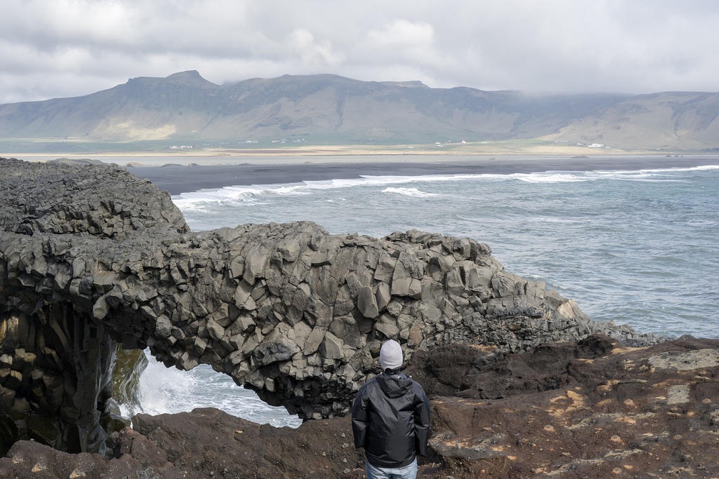 Rock arch above Kirkjufjara