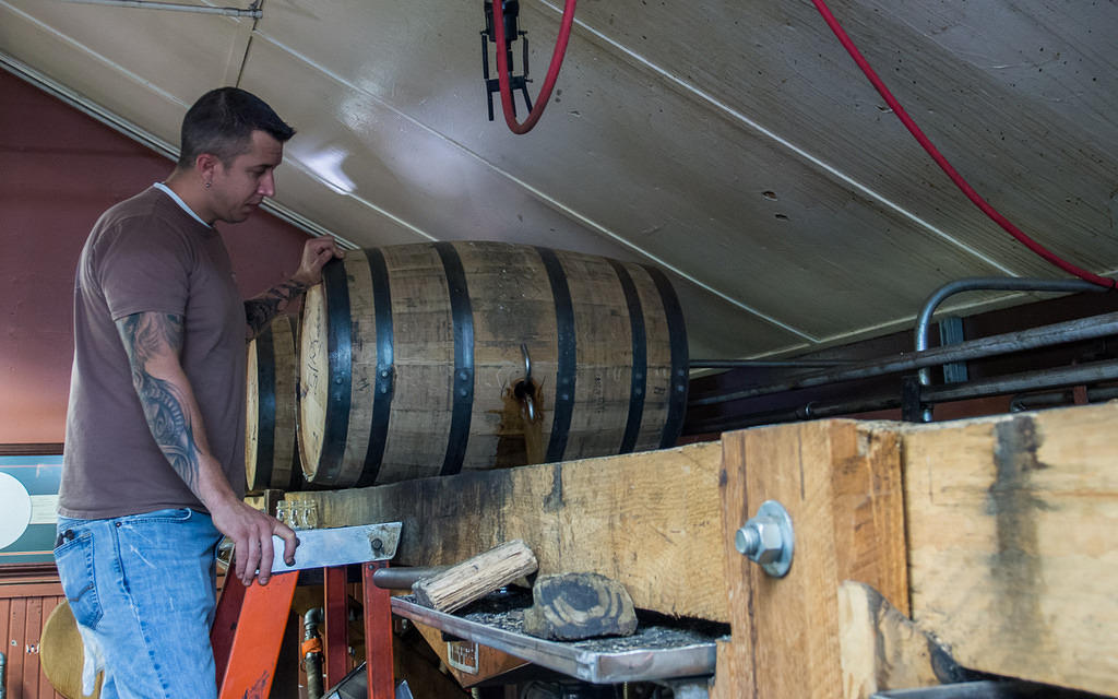 Pouring out a single barrel for Blanton's bourbon