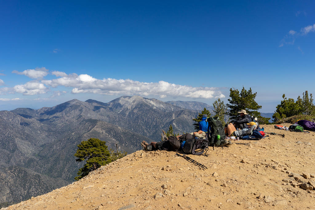 Through hikers resting on the summit