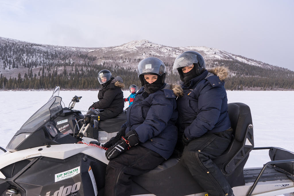 Greg, Brooke, and Randi snowmobiling