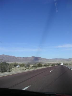 Contrail leaving a shadow.