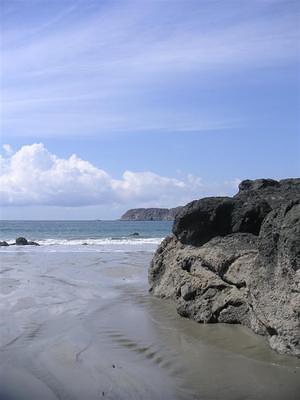 Walking down the beach outside Manuel Antonio