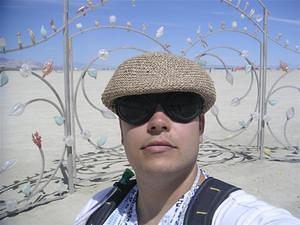 Chris in front of the glass blower's fence