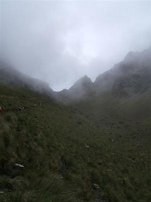 Ribbon of people trekking up to the top of the pass