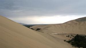 Climbing the dunes of Huacachina