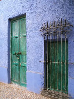 Blue wall, green door and window