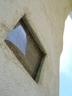 Arch window shows they are made with straw and mud