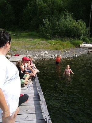 Kids braving the cool lake