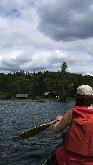 Anna padles towards the lodge