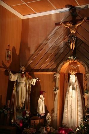 Mini church inside the back of the Catholic health food store