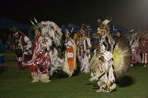 Fancy and Traditional dancers during powwow intertribal dancing