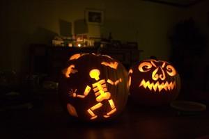 Chris (bat, skeleton, moon, etc) and Anna's (scary face) carved pumpkins