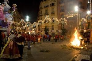 The casal watches the burning falla