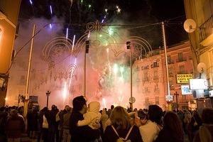 A falla starts to burn with fireworks