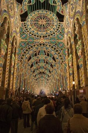 Crowd moving through Iluminación Falla Sueca-Literato Azorín