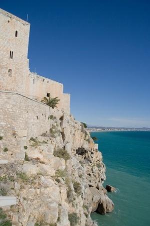 Castle walls fortify the sea