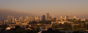 Sunrise over a smokey downtown San Diego