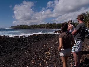 Brooke, Greg, and Jeff watch the surfers