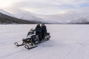 Randi and Brooke snowmobiling on Fish Lake